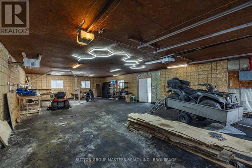 3837 Holmes Road, Frontenac (Frontenac South), ON - Indoor Photo Showing Garage
