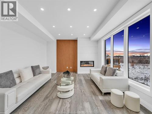 118 Bear Street, Essex, ON - Indoor Photo Showing Living Room With Fireplace