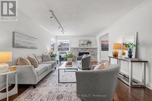 185 Withrow Avenue, Ottawa, ON - Indoor Photo Showing Living Room With Fireplace