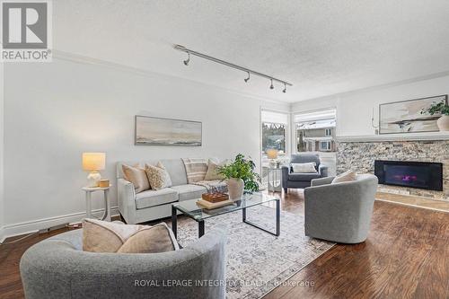 185 Withrow Avenue, Ottawa, ON - Indoor Photo Showing Living Room With Fireplace