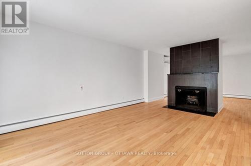 517 Braydon Avenue, Ottawa, ON - Indoor Photo Showing Living Room With Fireplace