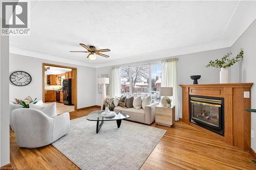 Living Room with Gas Fireplace - 126 West 4Th Street, Hamilton, ON - Indoor Photo Showing Living Room With Fireplace