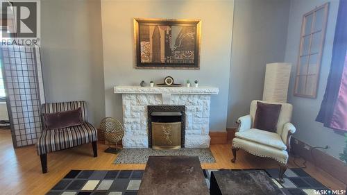 12 2201 14Th Avenue, Regina, SK - Indoor Photo Showing Living Room With Fireplace
