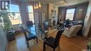 12 2201 14Th Avenue, Regina, SK  - Indoor Photo Showing Dining Room With Fireplace 