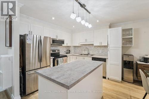 212 - 1275 Cornerbrook Place, Mississauga, ON - Indoor Photo Showing Kitchen With Stainless Steel Kitchen With Double Sink