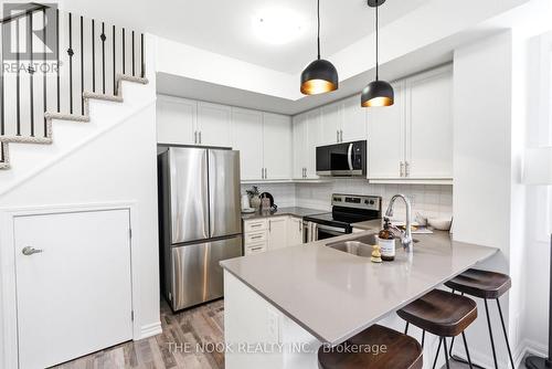 401 - 1460 Whites Road, Pickering (Woodlands), ON - Indoor Photo Showing Kitchen With Stainless Steel Kitchen With Double Sink With Upgraded Kitchen