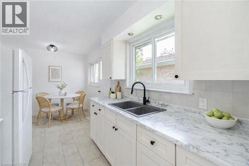 Virtually staged - 1093 Parthia Crescent, Mississauga, ON - Indoor Photo Showing Kitchen With Double Sink