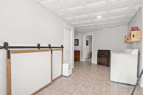 Salle familiale - 7 Rue St-André, Mont-Blanc, QC - Indoor Photo Showing Laundry Room