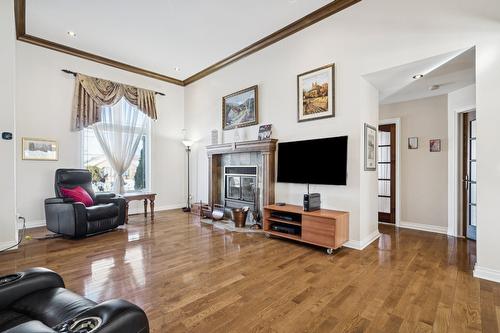 Salon - 4 Rue Des Tilleuls, Saint-Jean-Sur-Richelieu, QC - Indoor Photo Showing Living Room With Fireplace