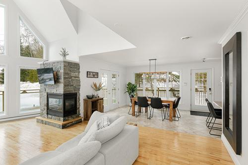 Salle à manger - 861  - 865 Rue Des Pinsons, Sainte-Adèle, QC - Indoor Photo Showing Living Room With Fireplace