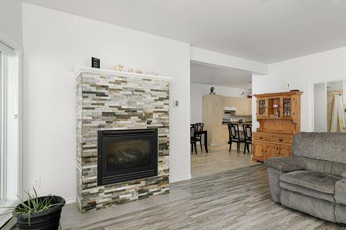 Logement - 861  - 865 Rue Des Pinsons, Sainte-Adèle, QC - Indoor Photo Showing Living Room With Fireplace