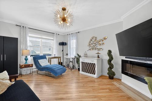 Salon - 36 Rue Du Marché, Sainte-Thérèse, QC - Indoor Photo Showing Other Room With Fireplace