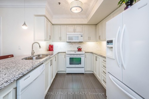 106-60 Baycliffe Crescent, Brampton, ON - Indoor Photo Showing Kitchen With Double Sink With Upgraded Kitchen
