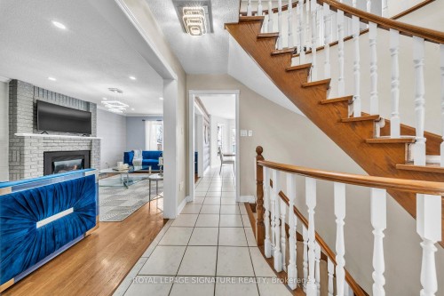 22 Stoddart Court, Bradford West Gwillimbury, ON - Indoor Photo Showing Other Room With Fireplace