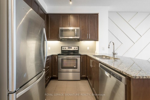 4203-3975 Grand Park Drive, Mississauga, ON - Indoor Photo Showing Kitchen With Double Sink With Upgraded Kitchen