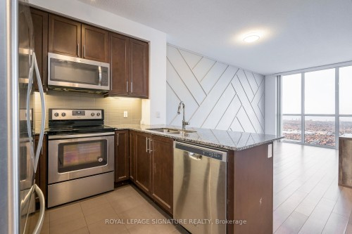4203-3975 Grand Park Drive, Mississauga, ON - Indoor Photo Showing Kitchen With Double Sink