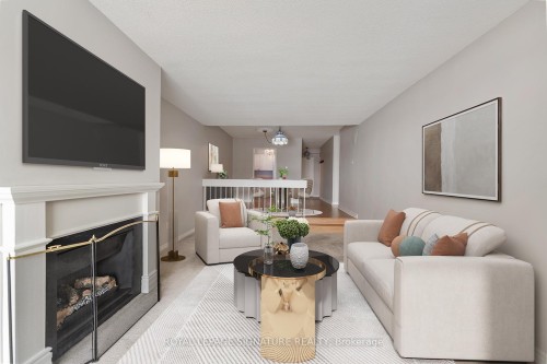 1503-1359 White Oaks Boulevard, Oakville, ON - Indoor Photo Showing Living Room With Fireplace