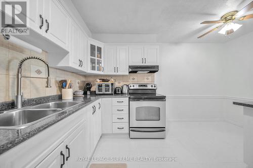 602 - 75 Emmett Avenue, Toronto, ON - Indoor Photo Showing Kitchen With Double Sink