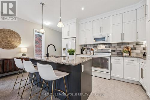 130 Snyder Avenue N, Woolwich, ON - Indoor Photo Showing Kitchen With Upgraded Kitchen