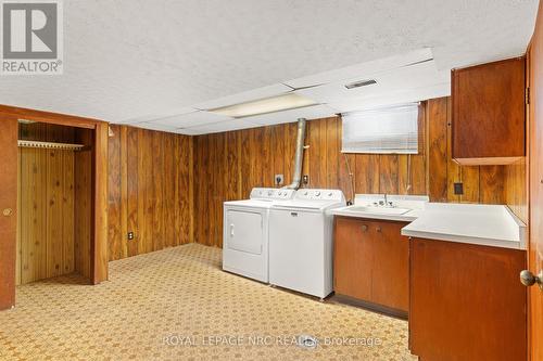Laundry room at base of stairs - 6 Brookbanks Drive N, St. Catharines (Lakeport), ON - Indoor Photo Showing Laundry Room