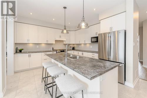 262 Dolman Street, Woolwich, ON - Indoor Photo Showing Kitchen With Double Sink With Upgraded Kitchen