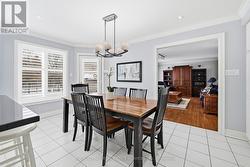 Bright Breakfast Area with a Walkout to Patio - 
