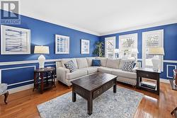 Formal Living Room with Hardwood Flooring - 