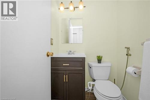 Half bath featuring vanity & toilet - 375 Kingscourt Drive Unit# 21, Waterloo, ON - Indoor Photo Showing Bathroom