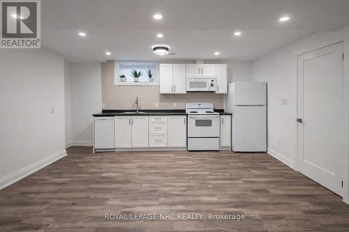 Kitchen - Downstairs - 14 - 4 Evergreen Common N, St. Catharines (Vine/Linwell), ON - Indoor Photo Showing Kitchen With Double Sink