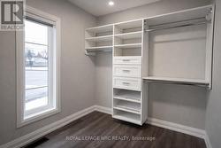Primary Bedroom Walk in Closet - 