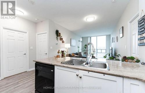 1702 - 3504 Hurontario Street, Mississauga, ON - Indoor Photo Showing Kitchen With Double Sink