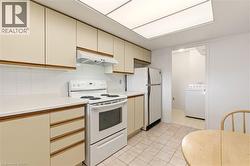 Kitchen w/ White Appliances - 