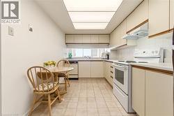 Kitchen w/ White Appliances - 