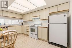 Kitchen w/ White Appliances - 