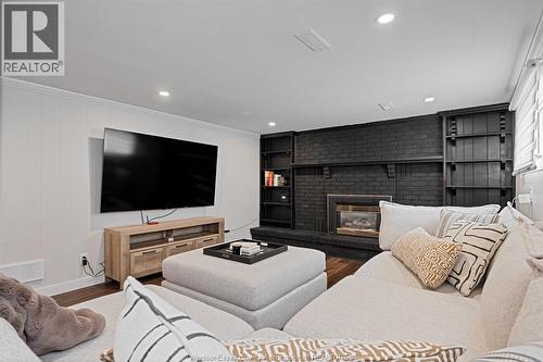 945 Laurier, Lasalle, ON - Indoor Photo Showing Living Room With Fireplace