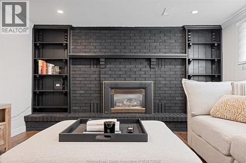945 Laurier, Lasalle, ON - Indoor Photo Showing Living Room With Fireplace