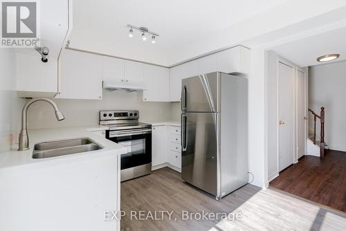 133 - 12421 Ninth Line, Whitchurch-Stouffville, ON - Indoor Photo Showing Kitchen With Stainless Steel Kitchen With Double Sink