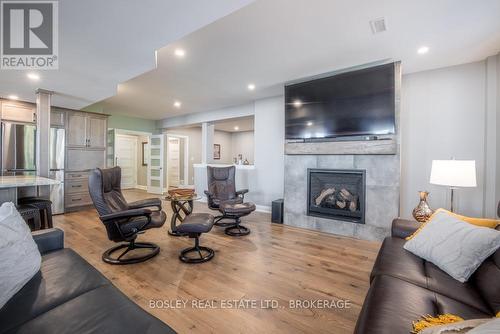 Lower level Kitchen - 1 Hurricane Road, Pelham (Fonthill), ON - Indoor Photo Showing Living Room With Fireplace