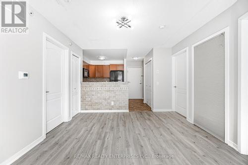 Open Concept Living Area - 1420 - 8 Dayspring Circle, Brampton, ON - Indoor Photo Showing Other Room