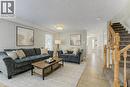 partially virtually staged - 404 Wake Robin Crescent, Kitchener, ON  - Indoor Photo Showing Living Room 
