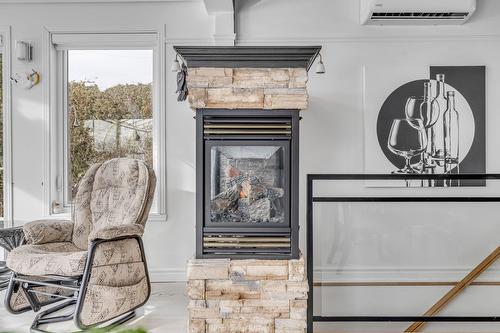 Living room - 2018 Rue Arnaud, Québec (Beauport), QC - Indoor Photo Showing Living Room With Fireplace