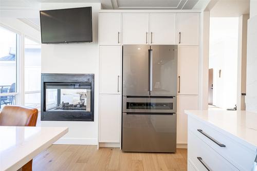 2102 Lillooet Court, Kelowna, BC - Indoor With Fireplace