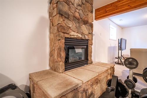 2102 Lillooet Court, Kelowna, BC - Indoor With Fireplace