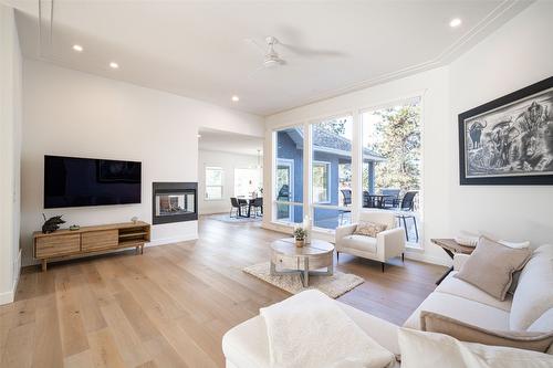 2102 Lillooet Court, Kelowna, BC - Indoor Photo Showing Living Room With Fireplace