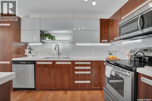 611 1015 Patrick Crescent, Saskatoon, SK - Indoor Photo Showing Kitchen With Stainless Steel Kitchen With Double Sink With Upgraded Kitchen