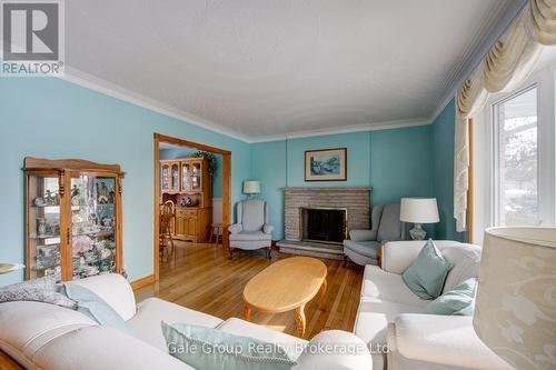 739 Pavey Street, Woodstock (Woodstock - South), ON - Indoor Photo Showing Living Room With Fireplace