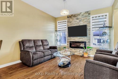 115 Holloway Terrace, Milton (Sc Scott), ON - Indoor Photo Showing Living Room With Fireplace