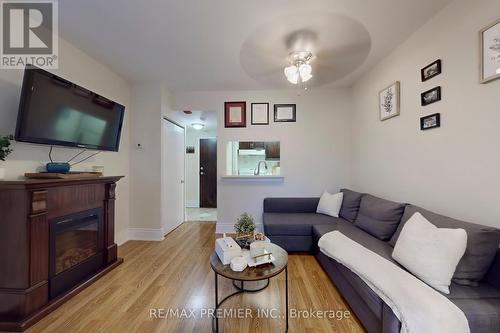 127 - 8351 Mclaughlin Road, Brampton, ON - Indoor Photo Showing Living Room With Fireplace