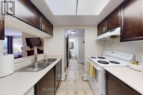 127 - 8351 Mclaughlin Road, Brampton, ON - Indoor Photo Showing Kitchen With Double Sink