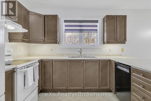 725 Binning Street W, North Perth (Listowel), ON - Indoor Photo Showing Kitchen With Double Sink